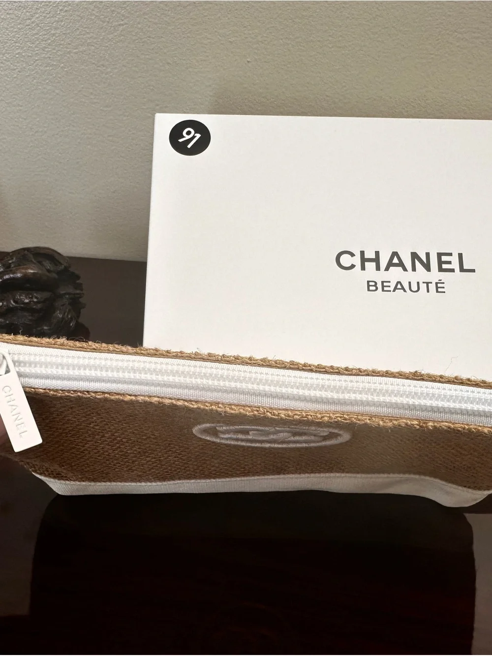 CHANEL Brown and White Woven Cosmetic Pouch with Logo